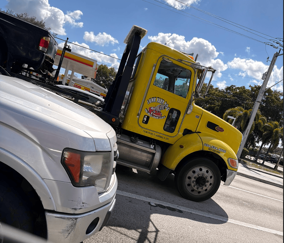 Tow truck for junk car buying service